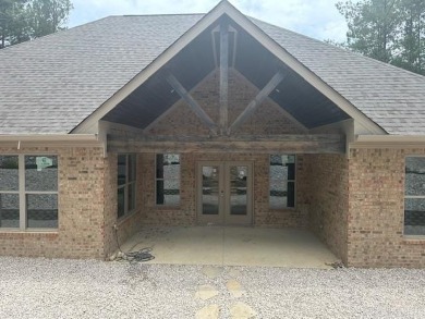 Welcome to your new sanctuary, perfectly situated on the on Isabella Golf Course  in Arkansas - for sale on GolfHomes.com, golf home, golf lot