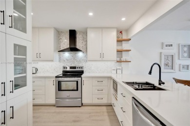 Beautifully renovated 2-bedroom condo sold fully furnished and on Palm-Aire Country Club and Resort - Palms in Florida - for sale on GolfHomes.com, golf home, golf lot