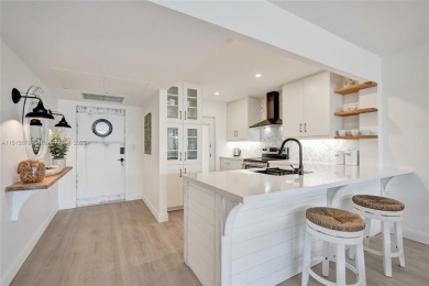 Beautifully renovated 2-bedroom condo sold fully furnished and on Palm-Aire Country Club and Resort - Palms in Florida - for sale on GolfHomes.com, golf home, golf lot