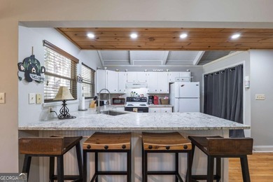 Experience luxury living in this beautifully remodeled 3-bedroom on Innsbruck Resort and Golf Club in Georgia - for sale on GolfHomes.com, golf home, golf lot