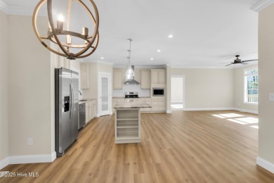 Why settle for ordinary when you can own this 2025 custom-built on Minnesott Golf and Country Club in North Carolina - for sale on GolfHomes.com, golf home, golf lot