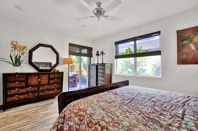 Nestled within Oxford Estates, a charming gated enclave in posh on Boca Lago Golf and Country Club in Florida - for sale on GolfHomes.com, golf home, golf lot