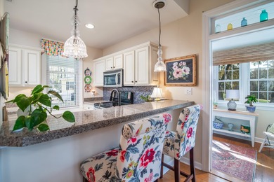 Experience the charm of this cozy townhome, tucked beneath the on Wachesaw Plantation Club in South Carolina - for sale on GolfHomes.com, golf home, golf lot
