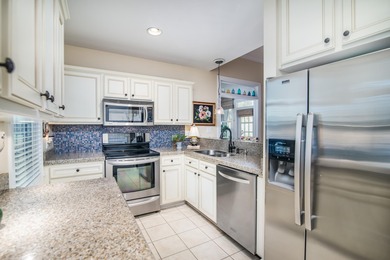 Experience the charm of this cozy townhome, tucked beneath the on Wachesaw Plantation Club in South Carolina - for sale on GolfHomes.com, golf home, golf lot