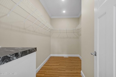 Why settle for ordinary when you can own this 2025 custom-built on Minnesott Golf and Country Club in North Carolina - for sale on GolfHomes.com, golf home, golf lot