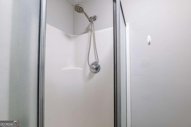 Experience luxury living in this beautifully remodeled 3-bedroom on Innsbruck Resort and Golf Club in Georgia - for sale on GolfHomes.com, golf home, golf lot