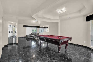 GOLF COMMUNITY - Discover the perfect blend of luxury and on Ventura Country Club in Florida - for sale on GolfHomes.com, golf home, golf lot