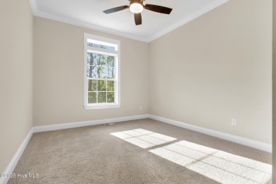 Why settle for ordinary when you can own this 2025 custom-built on Minnesott Golf and Country Club in North Carolina - for sale on GolfHomes.com, golf home, golf lot