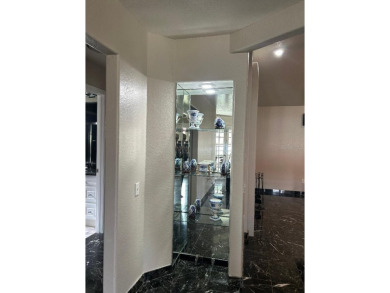GOLF COMMUNITY - Discover the perfect blend of luxury and on Ventura Country Club in Florida - for sale on GolfHomes.com, golf home, golf lot