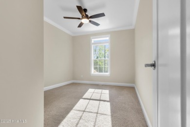 Why settle for ordinary when you can own this 2025 custom-built on Minnesott Golf and Country Club in North Carolina - for sale on GolfHomes.com, golf home, golf lot