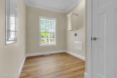 Why settle for ordinary when you can own this 2025 custom-built on Minnesott Golf and Country Club in North Carolina - for sale on GolfHomes.com, golf home, golf lot