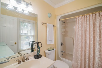 Experience the charm of this cozy townhome, tucked beneath the on Wachesaw Plantation Club in South Carolina - for sale on GolfHomes.com, golf home, golf lot