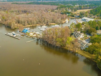 Experience the charm of this cozy townhome, tucked beneath the on Wachesaw Plantation Club in South Carolina - for sale on GolfHomes.com, golf home, golf lot