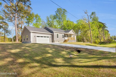 Why settle for ordinary when you can own this 2025 custom-built on Minnesott Golf and Country Club in North Carolina - for sale on GolfHomes.com, golf home, golf lot