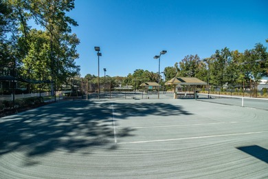 Experience the charm of this cozy townhome, tucked beneath the on Wachesaw Plantation Club in South Carolina - for sale on GolfHomes.com, golf home, golf lot