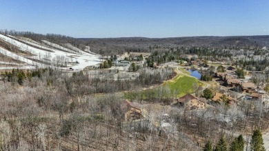 Welcome to 2100 Schuss Mountain Drive located in the Shanty on Schuss Mountain Golf Club in Michigan - for sale on GolfHomes.com, golf home, golf lot