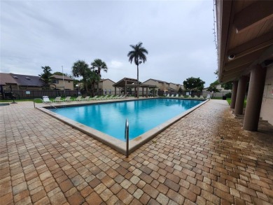 *THE ESCAPE* AT ARROWHEAD--2 BEDROOMS--LOFT STYLE---MASTER on Davie Golf Club in Florida - for sale on GolfHomes.com, golf home, golf lot