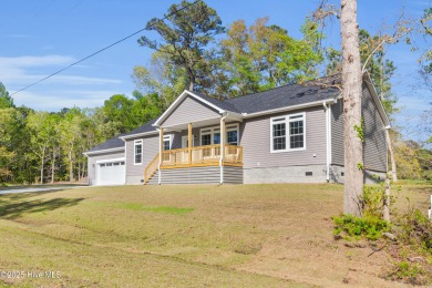 Why settle for ordinary when you can own this 2025 custom-built on Minnesott Golf and Country Club in North Carolina - for sale on GolfHomes.com, golf home, golf lot