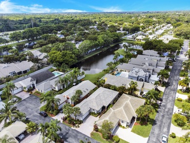 Nestled within Oxford Estates, a charming gated enclave in posh on Boca Lago Golf and Country Club in Florida - for sale on GolfHomes.com, golf home, golf lot