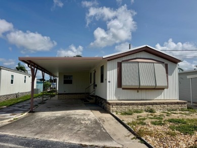 This updated 1985 single-wide mobile home offers just over 800 on Heather Hills Golf Course in Florida - for sale on GolfHomes.com, golf home, golf lot