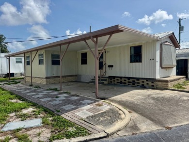 This updated 1985 single-wide mobile home offers just over 800 on Heather Hills Golf Course in Florida - for sale on GolfHomes.com, golf home, golf lot