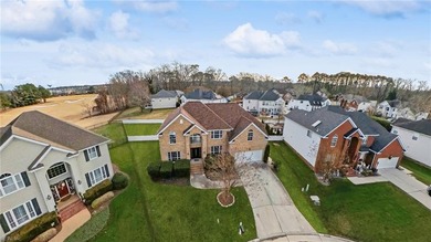 Nestled on the 7th hole of the prestigious Riverfront Golf Club on Riverfront Golf Club in Virginia - for sale on GolfHomes.com, golf home, golf lot