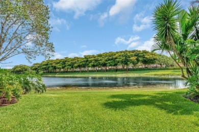 NICE... 3 BEDROOMS 3 FULL BATHROOMS ONE STORY WATERFRONT HOME on Weston Hills Country Club in Florida - for sale on GolfHomes.com, golf home, golf lot