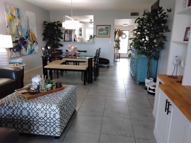 Nicely upgraded, top floor, fully tiled condo with screened on Sunrise Lakes Phase IV Golf Course in Florida - for sale on GolfHomes.com, golf home, golf lot