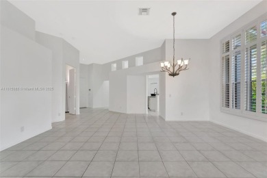 NICE... 3 BEDROOMS 3 FULL BATHROOMS ONE STORY WATERFRONT HOME on Weston Hills Country Club in Florida - for sale on GolfHomes.com, golf home, golf lot
