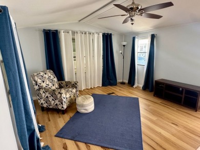 This updated 1985 single-wide mobile home offers just over 800 on Heather Hills Golf Course in Florida - for sale on GolfHomes.com, golf home, golf lot