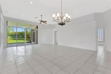 NICE... 3 BEDROOMS 3 FULL BATHROOMS ONE STORY WATERFRONT HOME on Weston Hills Country Club in Florida - for sale on GolfHomes.com, golf home, golf lot