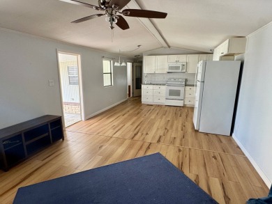 This updated 1985 single-wide mobile home offers just over 800 on Heather Hills Golf Course in Florida - for sale on GolfHomes.com, golf home, golf lot