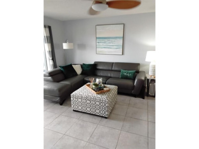Nicely upgraded, top floor, fully tiled condo with screened on Sunrise Lakes Phase IV Golf Course in Florida - for sale on GolfHomes.com, golf home, golf lot