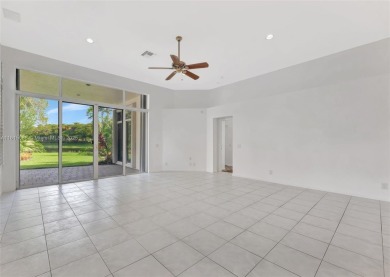 NICE... 3 BEDROOMS 3 FULL BATHROOMS ONE STORY WATERFRONT HOME on Weston Hills Country Club in Florida - for sale on GolfHomes.com, golf home, golf lot