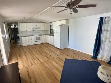 This updated 1985 single-wide mobile home offers just over 800 on Heather Hills Golf Course in Florida - for sale on GolfHomes.com, golf home, golf lot