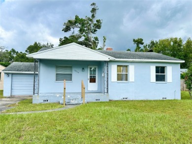 3 bedroom 1 bath on an oversized lot close to everything in on Clearwater Country Club in Florida - for sale on GolfHomes.com, golf home, golf lot