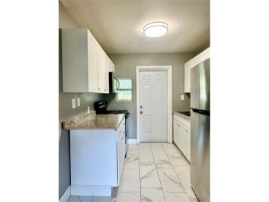3 bedroom 1 bath on an oversized lot close to everything in on Clearwater Country Club in Florida - for sale on GolfHomes.com, golf home, golf lot