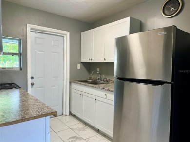3 bedroom 1 bath on an oversized lot close to everything in on Clearwater Country Club in Florida - for sale on GolfHomes.com, golf home, golf lot