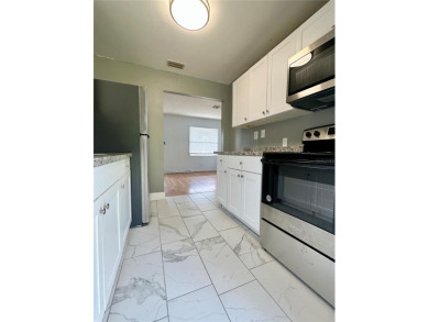 3 bedroom 1 bath on an oversized lot close to everything in on Clearwater Country Club in Florida - for sale on GolfHomes.com, golf home, golf lot