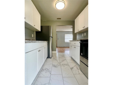 3 bedroom 1 bath on an oversized lot close to everything in on Clearwater Country Club in Florida - for sale on GolfHomes.com, golf home, golf lot