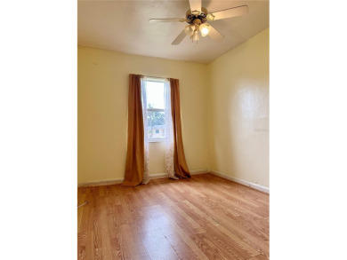 3 bedroom 1 bath on an oversized lot close to everything in on Clearwater Country Club in Florida - for sale on GolfHomes.com, golf home, golf lot