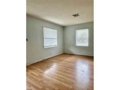 3 bedroom 1 bath on an oversized lot close to everything in on Clearwater Country Club in Florida - for sale on GolfHomes.com, golf home, golf lot