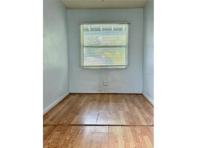 3 bedroom 1 bath on an oversized lot close to everything in on Clearwater Country Club in Florida - for sale on GolfHomes.com, golf home, golf lot