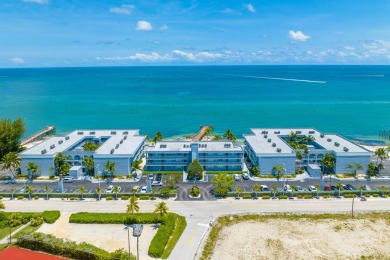 Start your day with a coffee while watching the sunrise over the on Key Colony Beach Golf Course in Florida - for sale on GolfHomes.com, golf home, golf lot