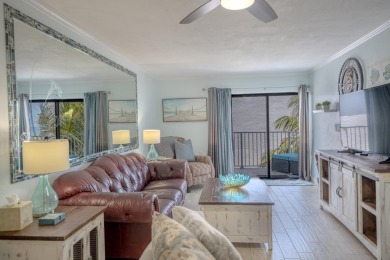 Start your day with a coffee while watching the sunrise over the on Key Colony Beach Golf Course in Florida - for sale on GolfHomes.com, golf home, golf lot