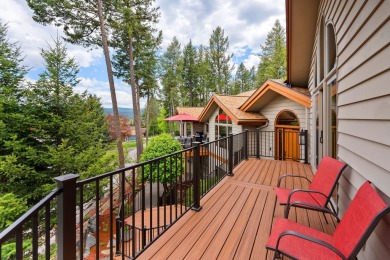 If you want beautiful Swan Mountain views from almost every room on Eagle Bend Golf Course in Montana - for sale on GolfHomes.com, golf home, golf lot