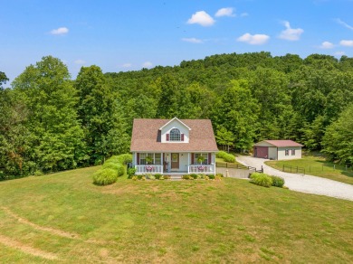 Welcome to this cozy Kentucky home neighboring the golf course! on Hickory Hills Country Club in Kentucky - for sale on GolfHomes.com, golf home, golf lot