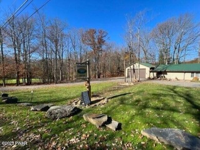 Tanglwood Lakes sprawling home situated on a level wooded lot on Paupack Hills Golf and Country Club in Pennsylvania - for sale on GolfHomes.com, golf home, golf lot