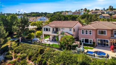 PANORAMIC VIEWS! This stunning home is nestled in the beautiful on Aliso Viejo Country Club in California - for sale on GolfHomes.com, golf home, golf lot