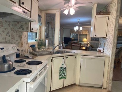 TIRED OF SNOW,ICE AND COLD, TRADE IT IN FOR SUN,WARM AND WHITE on Pine Lakes Country Club in Florida - for sale on GolfHomes.com, golf home, golf lot